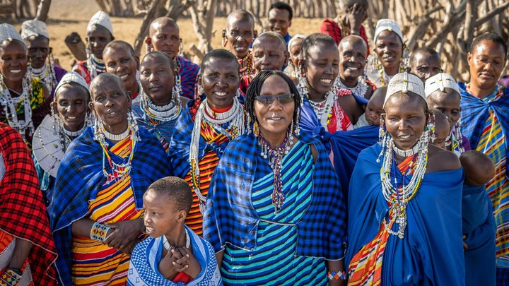 Pastoral Women's Council Co-Founder and Executive Director Maanda Ngoitiko and founding council members stand together.